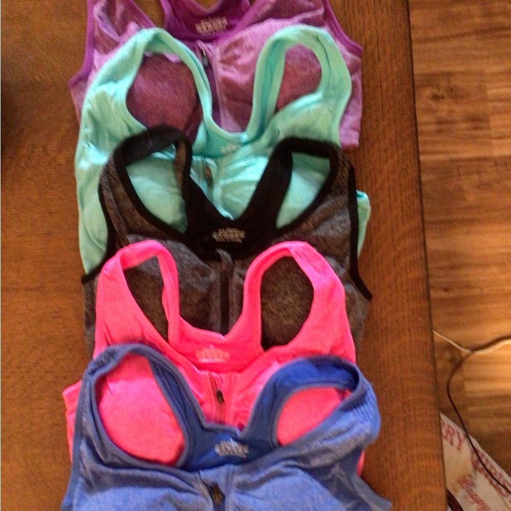 New Yeyele women zip front racer back sports bra size large. Five pack